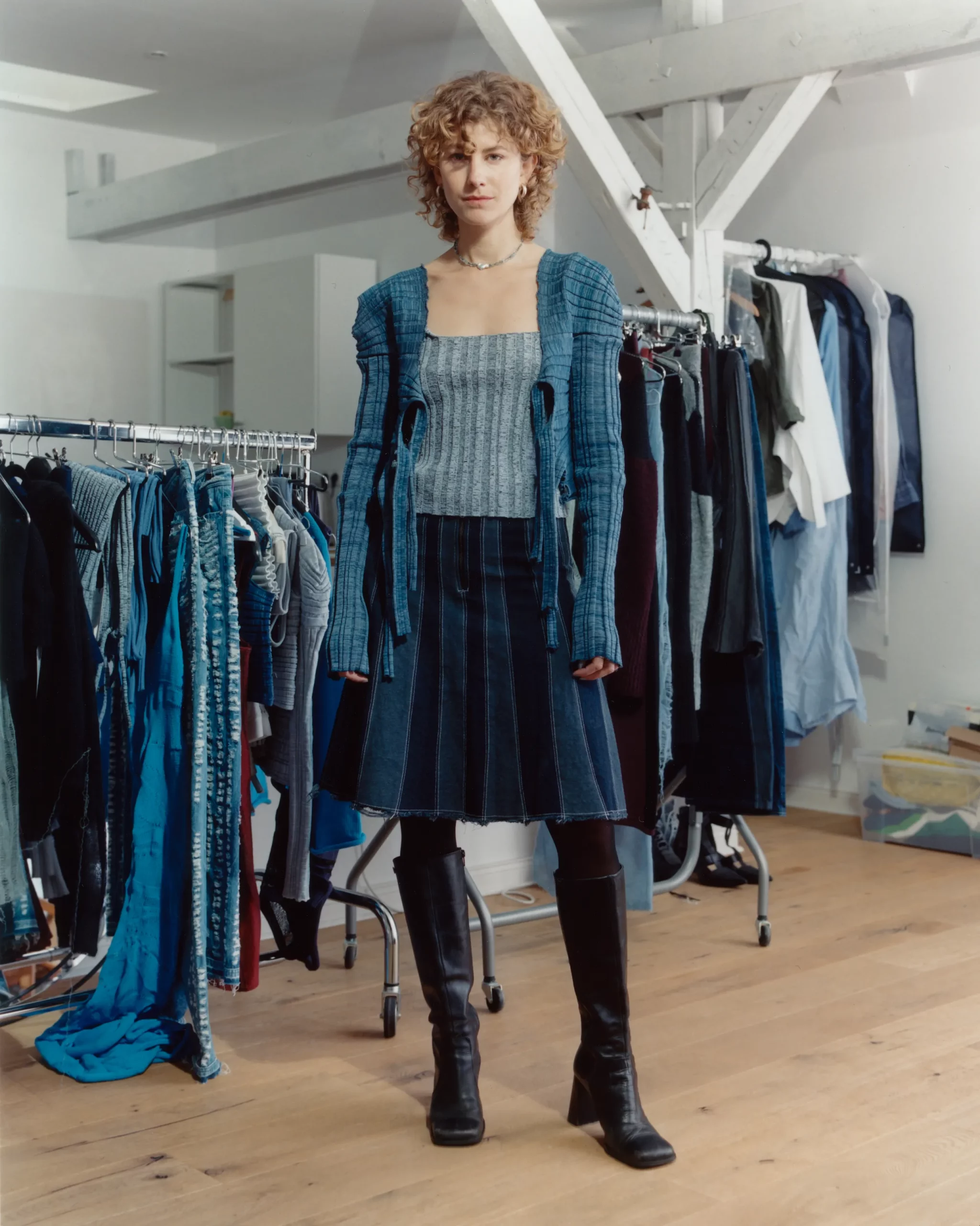 Berlin based Knitwear designer Katharina Dubbick wearing her own designs in her studio. Photographed by Charlotte Helwig.